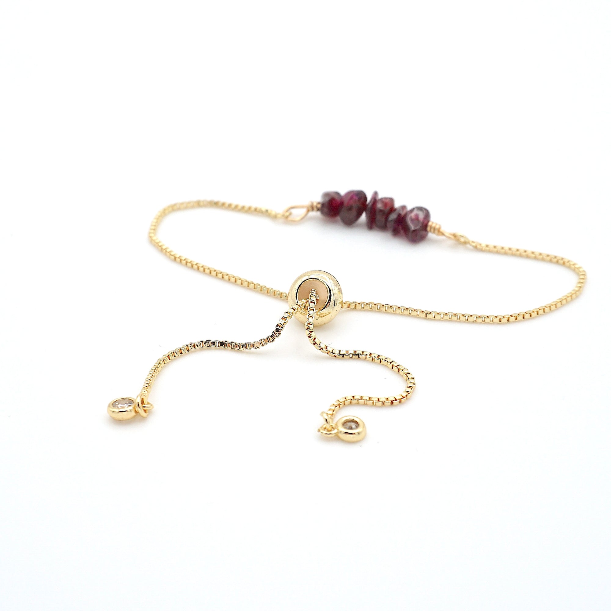 Gold plated brass slider closure on adjustable garnet bracelet showing easy fit mechanism - handcrafted birthstone jewelry