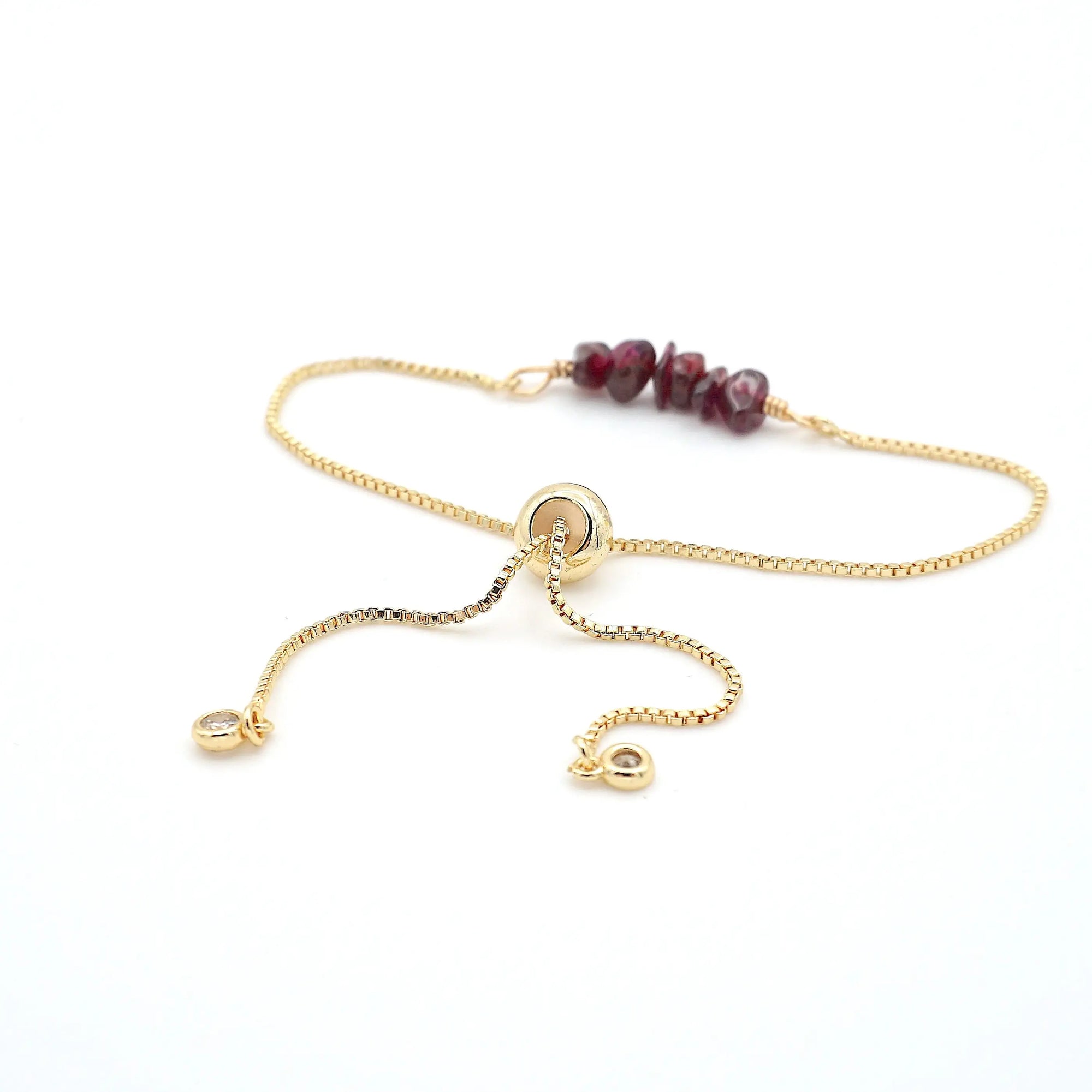 Gold plated brass slider closure on adjustable garnet bracelet showing easy fit mechanism - handcrafted birthstone jewelry