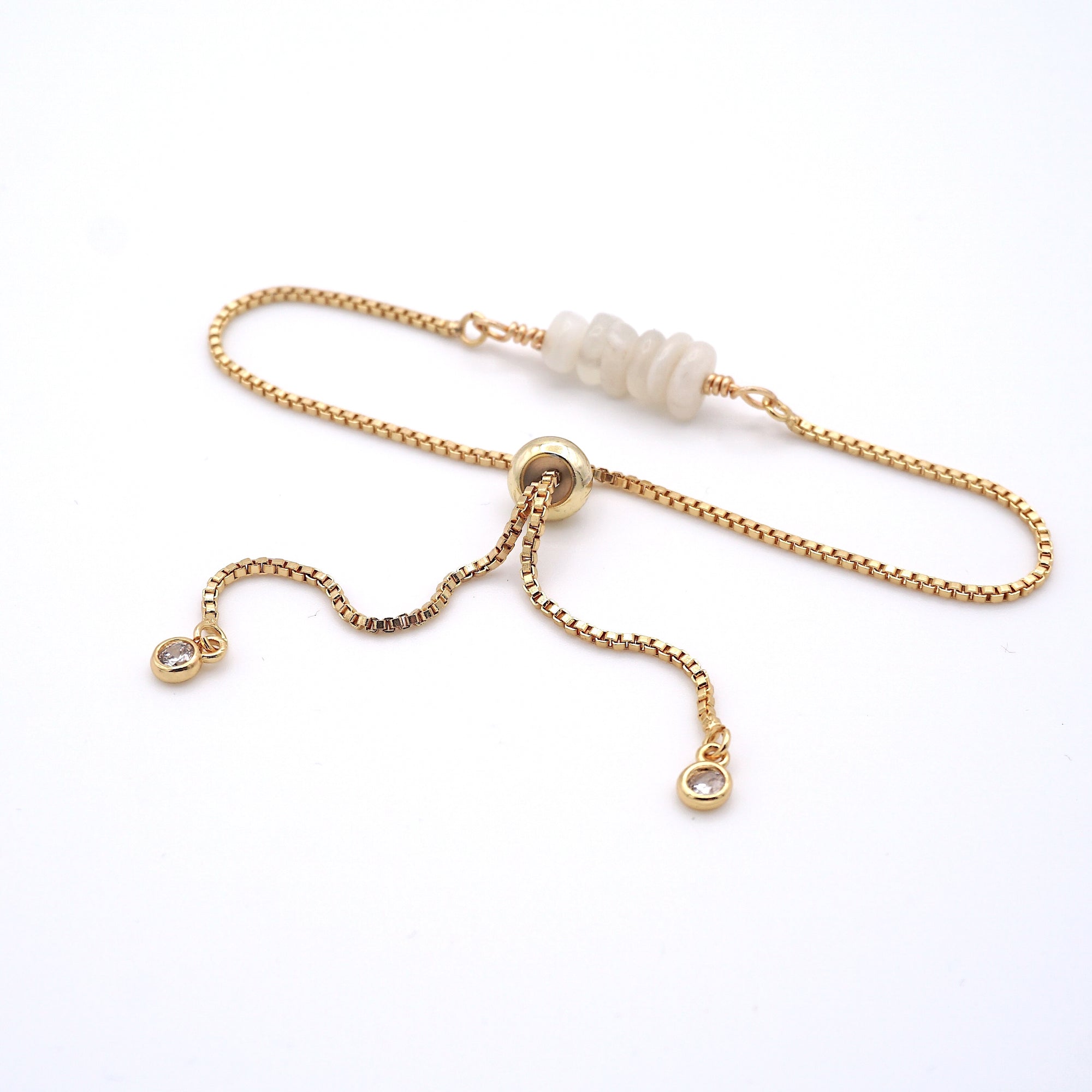 Gold plated brass slider closure on adjustable moonstone bracelet showing easy fit mechanism - handcrafted birthstone jewelry