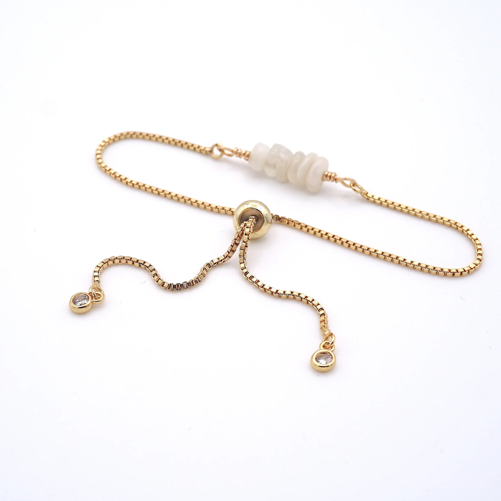 Gold plated brass slider closure on adjustable moonstone bracelet showing easy fit mechanism - handcrafted birthstone jewelry
