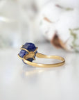 Back view of adjustable raw sapphire ring showing the gold vermeil band and adjustable artisan design