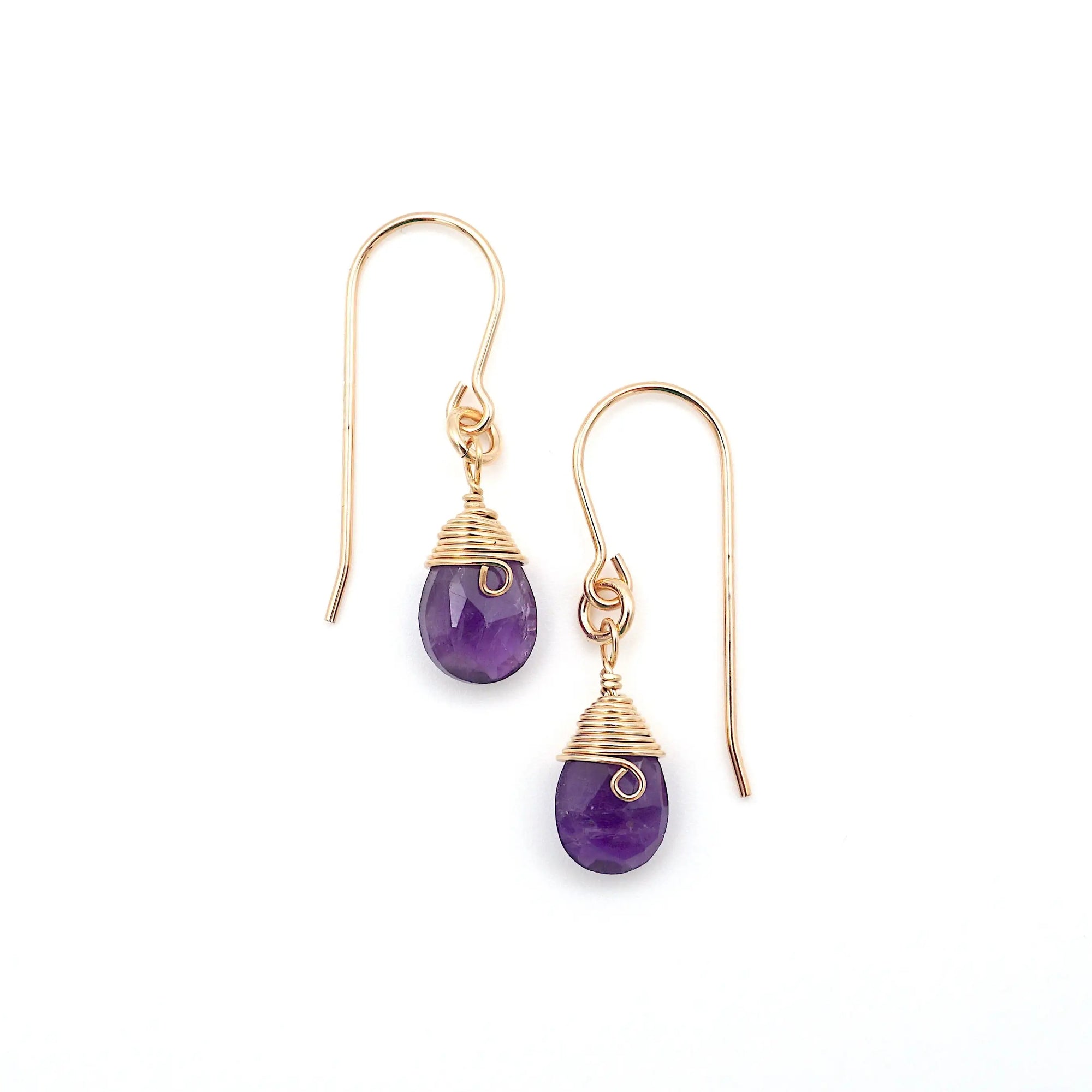 Detailed front view of amethyst drop earrings, genuine faceted amethyst with minimalist 14k gold filled wire wrapping, Designs by Nature Gems