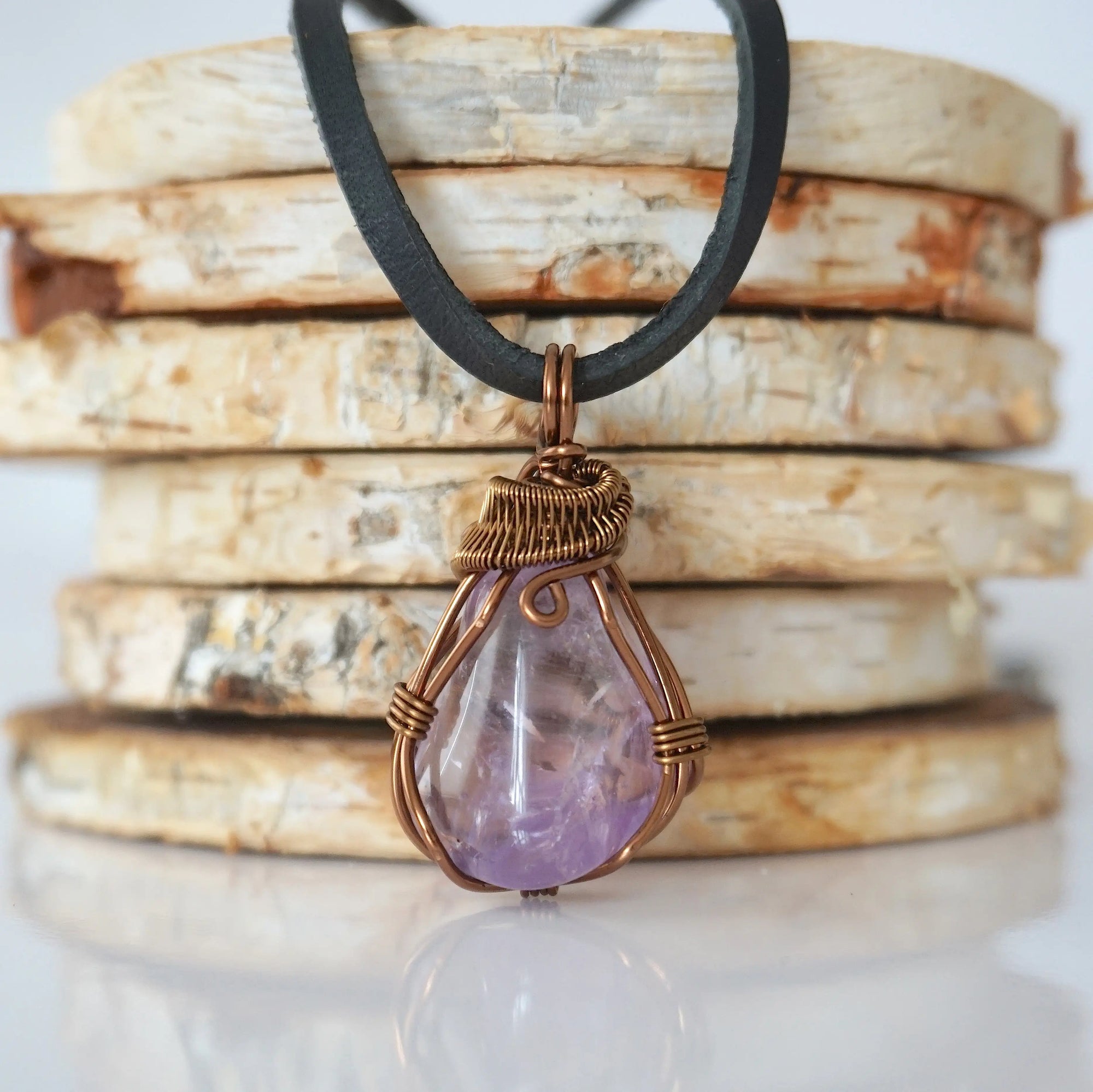 Amethyst necklace for men — handmade bronze copper wire wrapped pendant on black leather cord, February birthstone, by Designs by Nature Gems