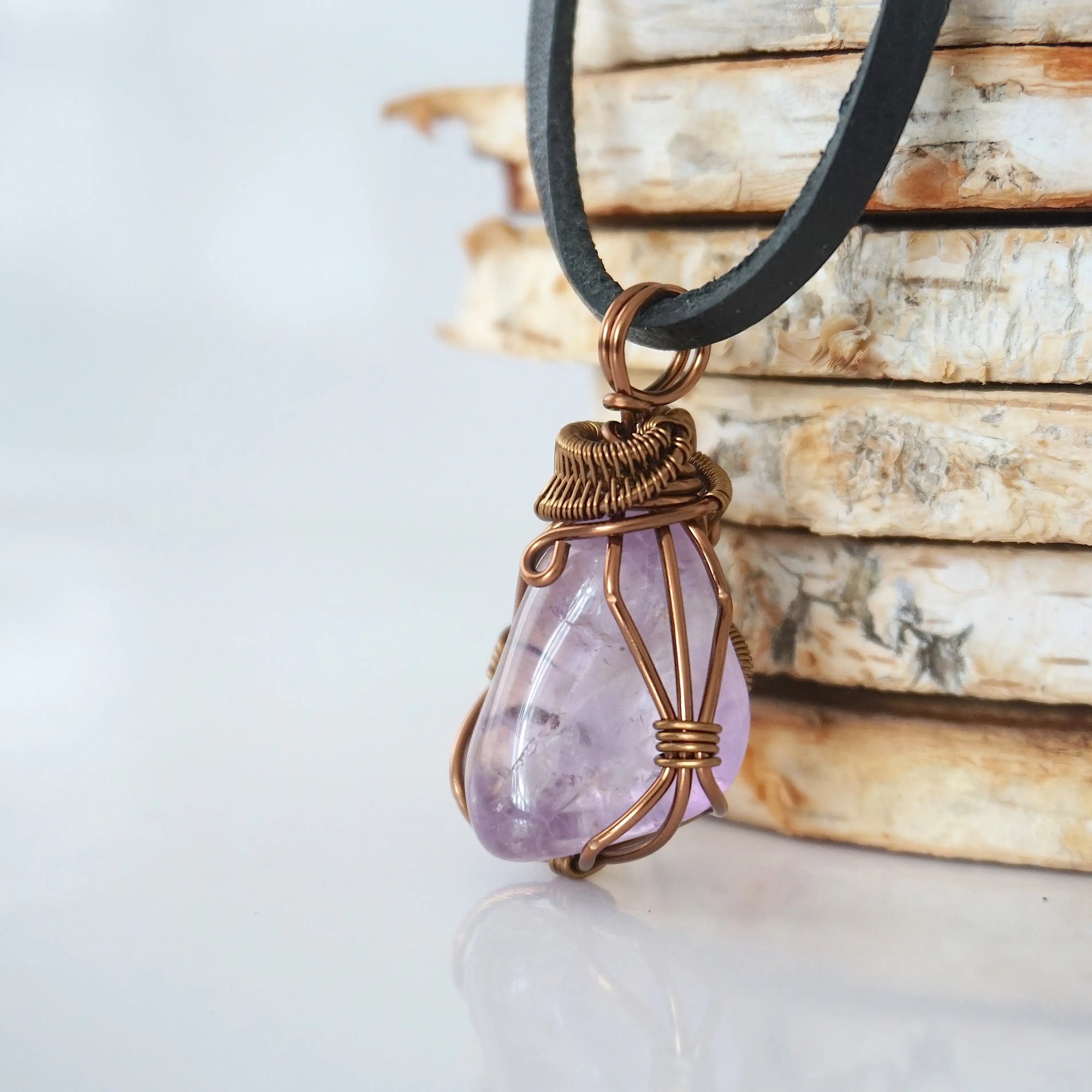 Left side detail of mens amethyst pendant — intricate bronze copper finish wire weaving technique, nickel-free wire, handcrafted artisan wire wrapped jewelry, Designs by Nature Gems