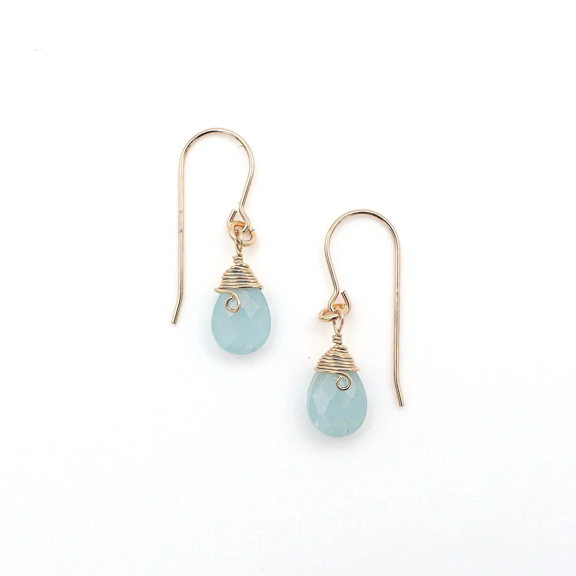 Detailed look at aquamarine drop earrings, genuine faceted aquamarine with minimalist artisan wire wrapping, 14k gold filled, Designs by Nature Gems