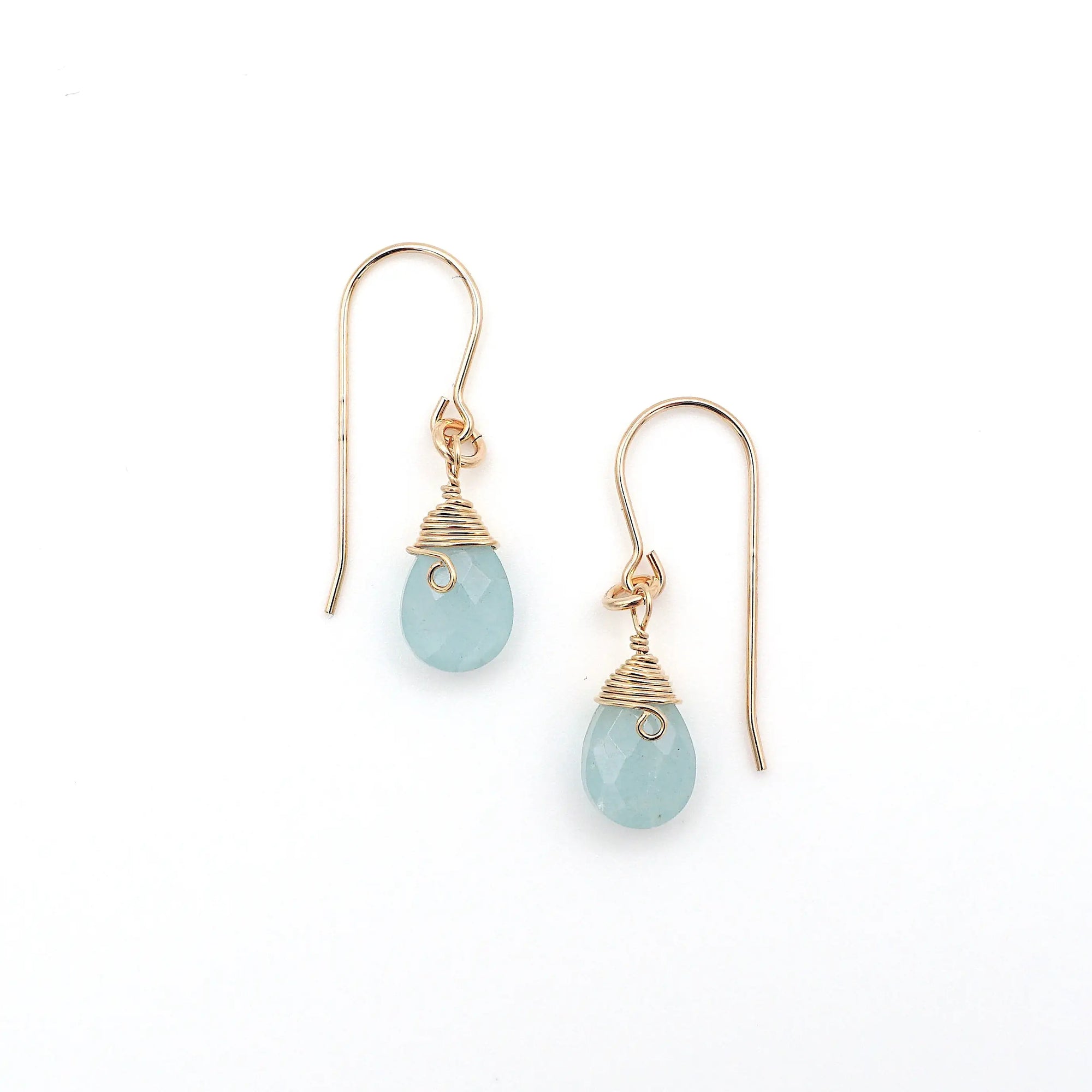 Detailed look at aquamarine drop earrings, genuine faceted aquamarine with minimalist artisan wire wrapping, 14k gold filled, Designs by Nature Gems