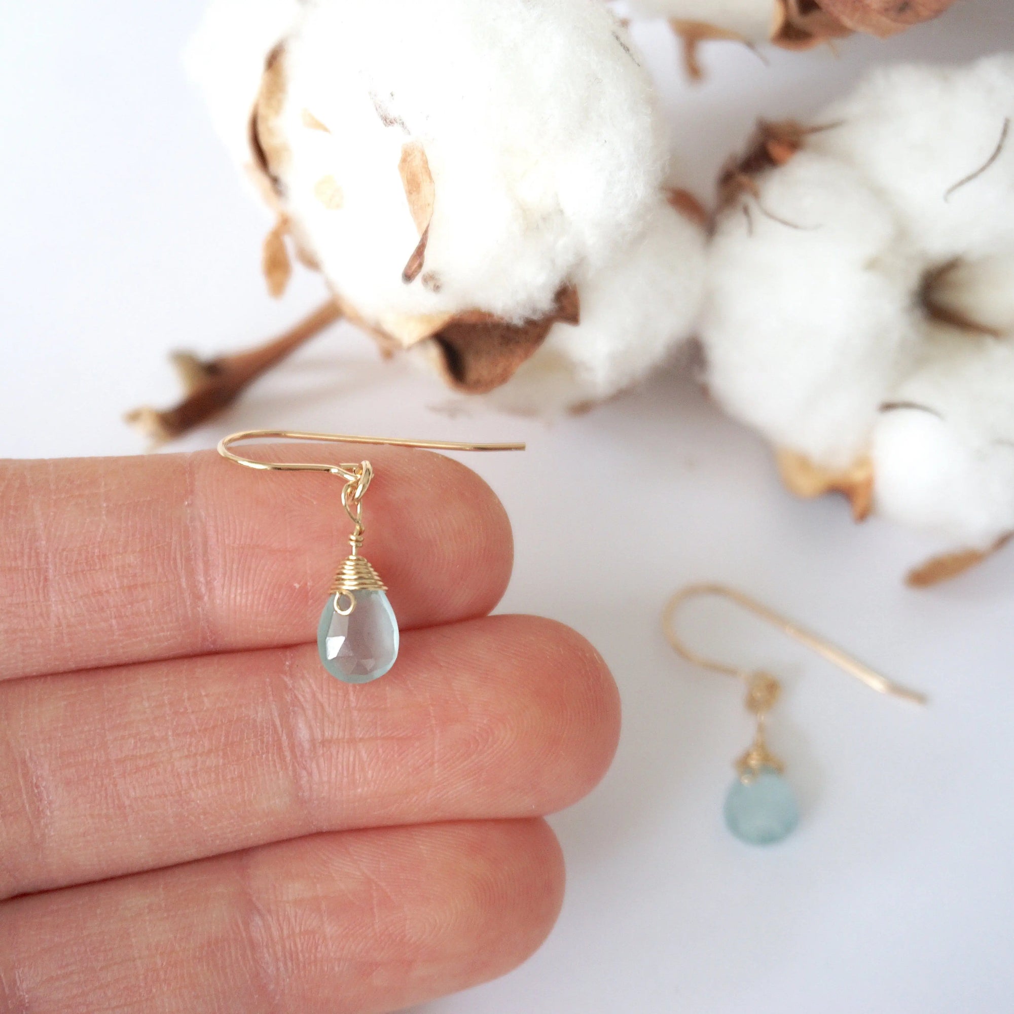 Aquamarine drop earrings in a hand for size reference, genuine faceted aquamarine, 14k gold filled, artisan crafted