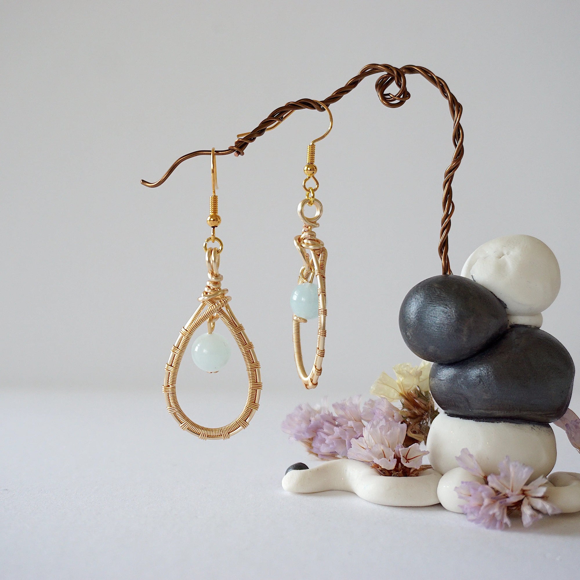 Aquamarine drop earrings with detailed artisan wire wrapping, polished 8mm genuine aquamarine bead, warm gold finish, Designs by Nature Gems
