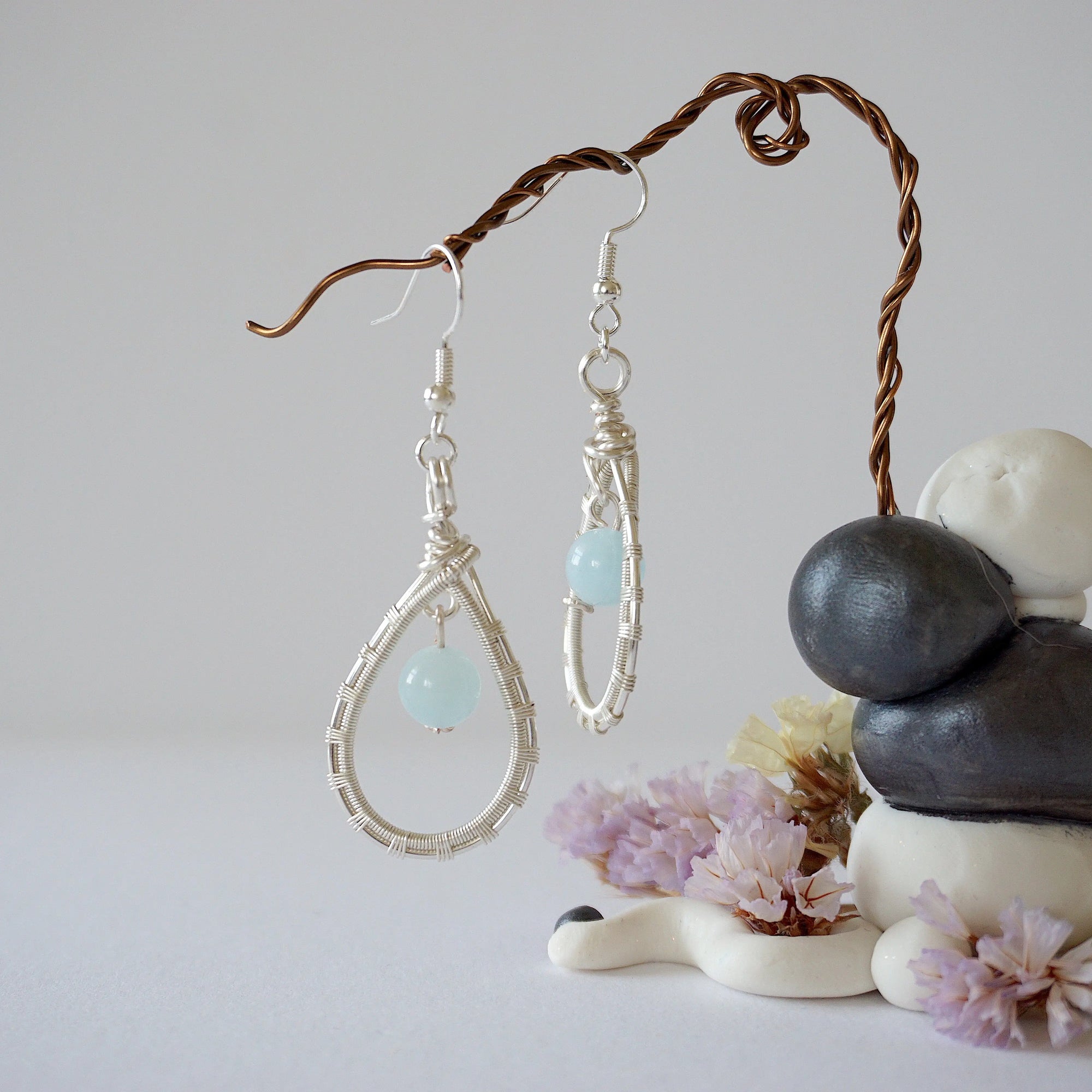 Aquamarine earrings, detailed front view, genuine gemstone in artisan wire wrapped setting, soft silver finish, Designs by Nature Gems