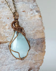 Right angle detail of genuine aquamarine necklace, wire wrapped in antique bronze copper by Designs by Nature Gems.
