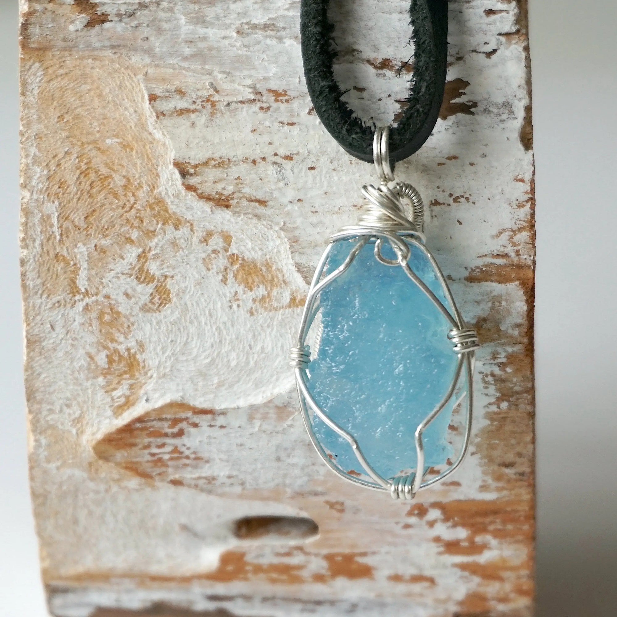 Back view of raw aquamarine pendant, genuine stone with handcrafted sterling silver wire, men's necklace