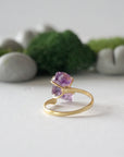 Back view of adjustable 14k gold vermeil ring with natural raw amethyst stone in claw setting