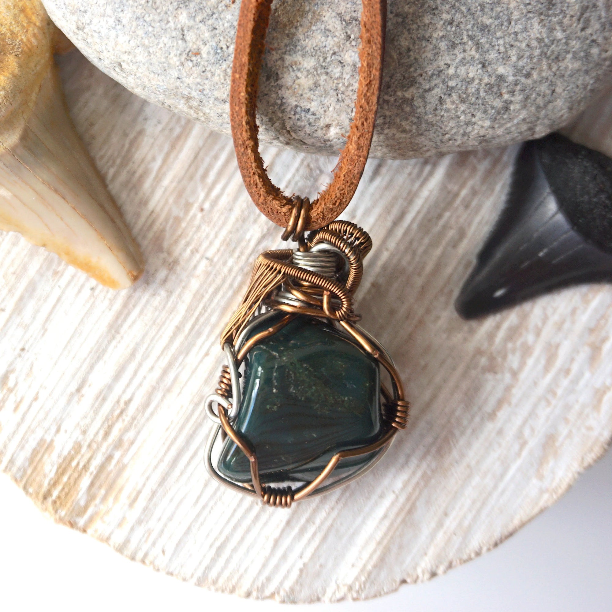 Back view of natural bloodstone necklace pendant, handcrafted crystal jewelry by Designs by Nature Gems.