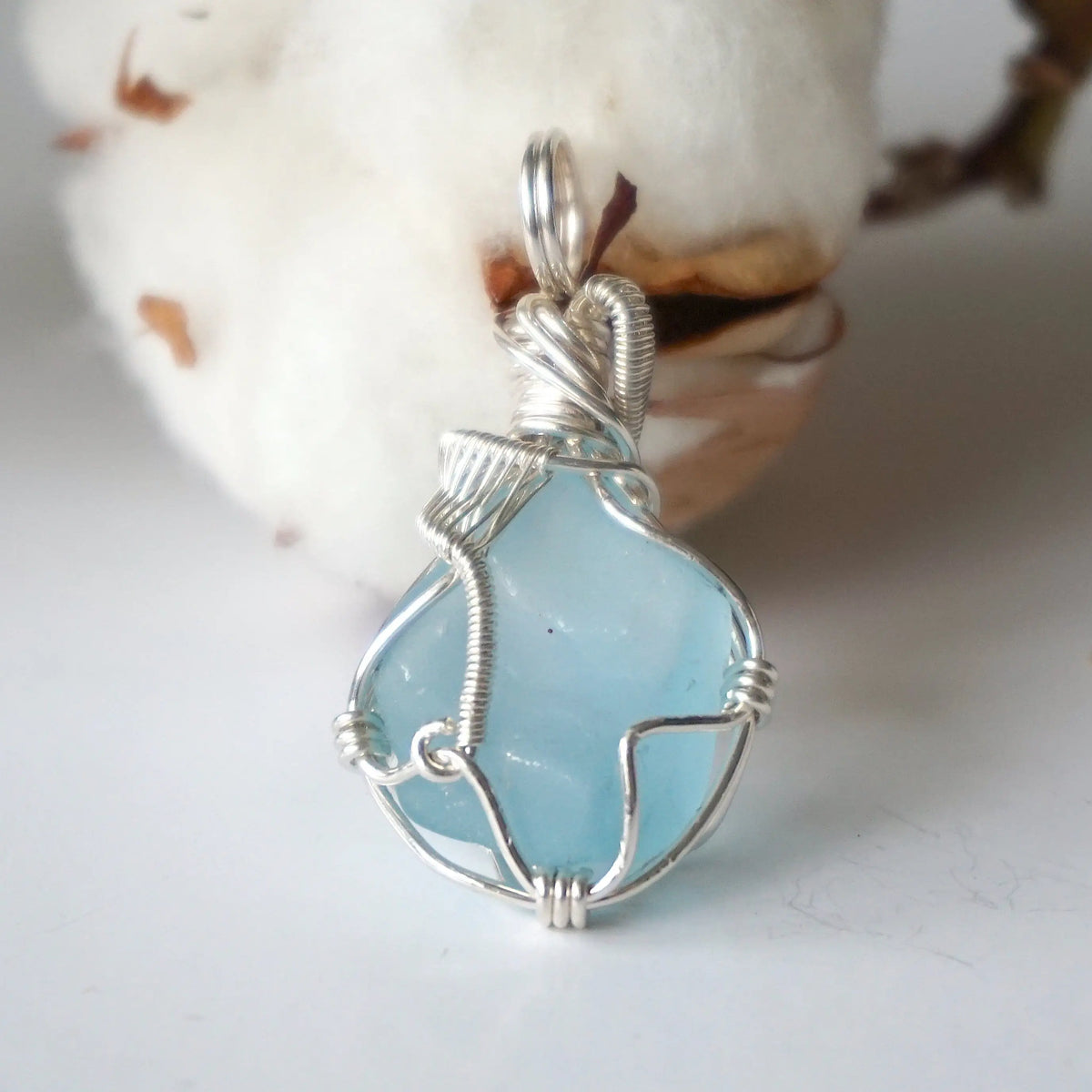Blue topaz crystal pendant, hand wire-wrapped in sterling silver