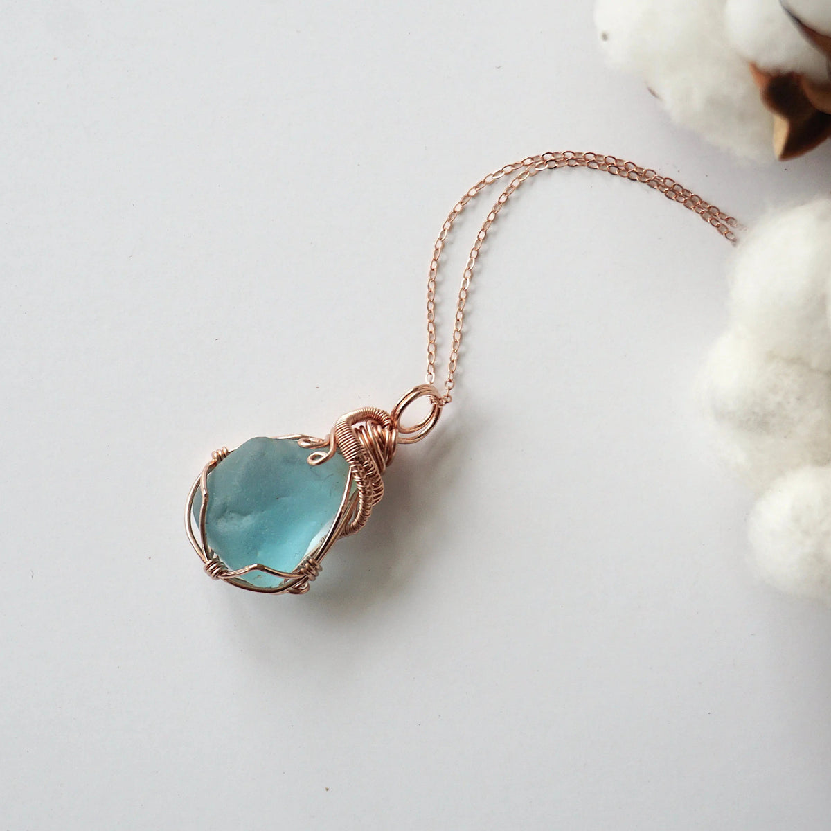 Blue topaz necklace on a 14k rose gold filled fine cable chain
