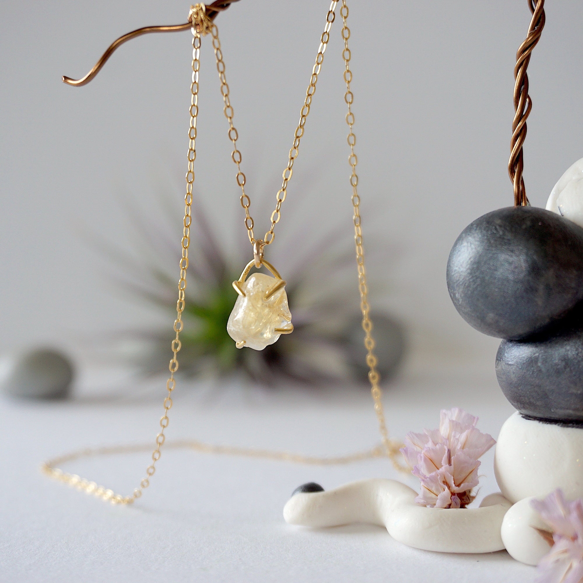 Close up front view of natural citrine crystal wire wrapped in 14k gold-filled - charm necklace pendant detail showing golden gemstone handmade