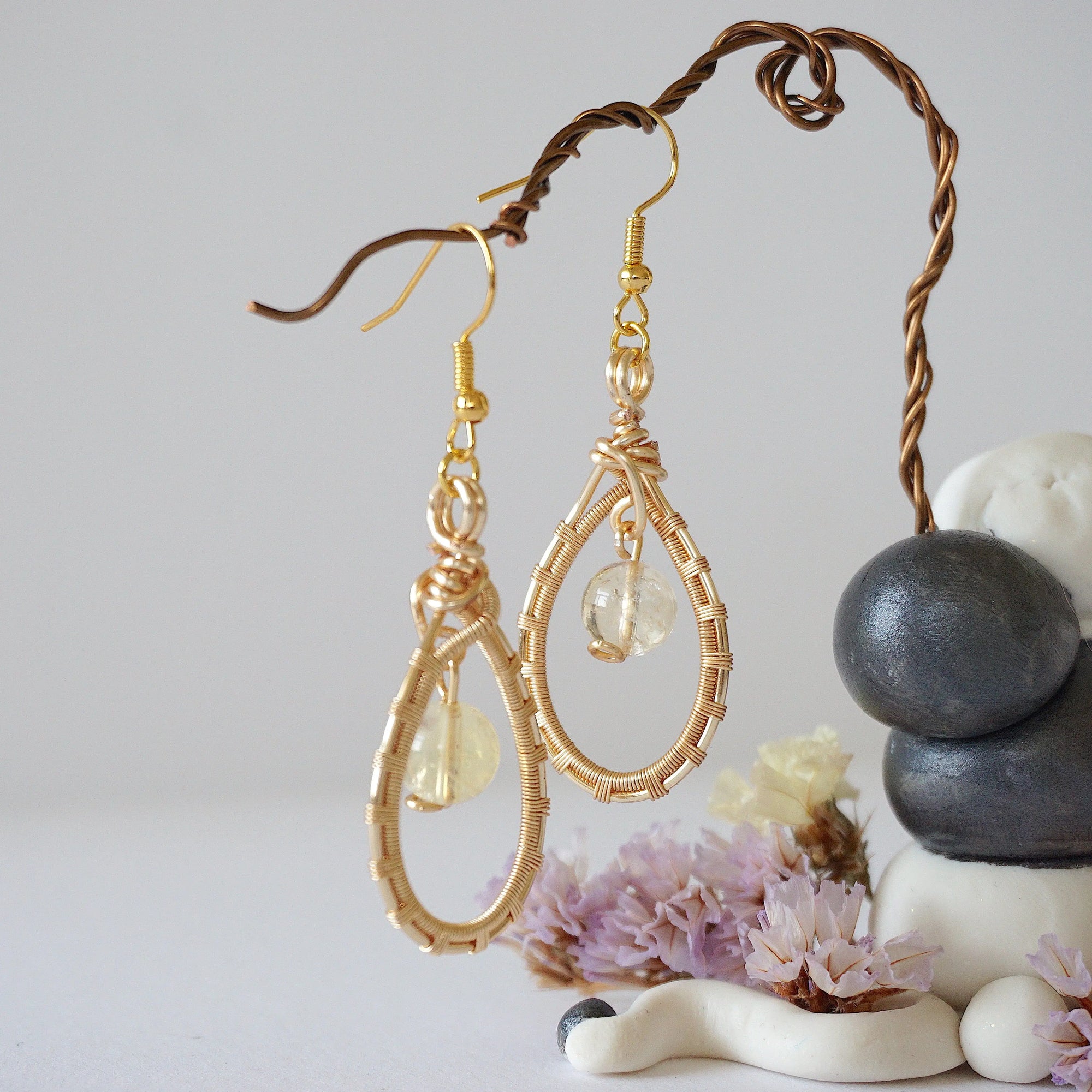 Back view of citrine drop earrings showing gold plated ear wire and wire wrap detail - handmade natural crystal dangle earrings back side