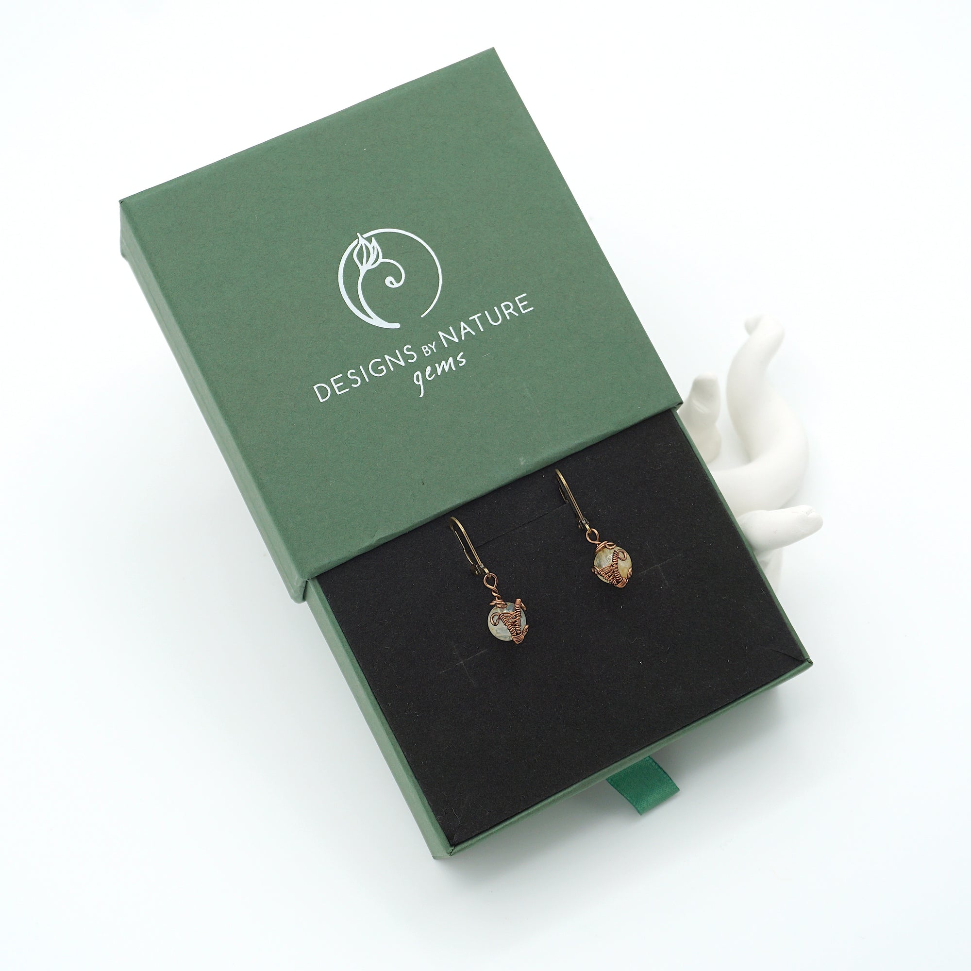 Citrine drop earrings presented in a branded gift box, ready for gifting, with antique bronze copper wire wrapping.