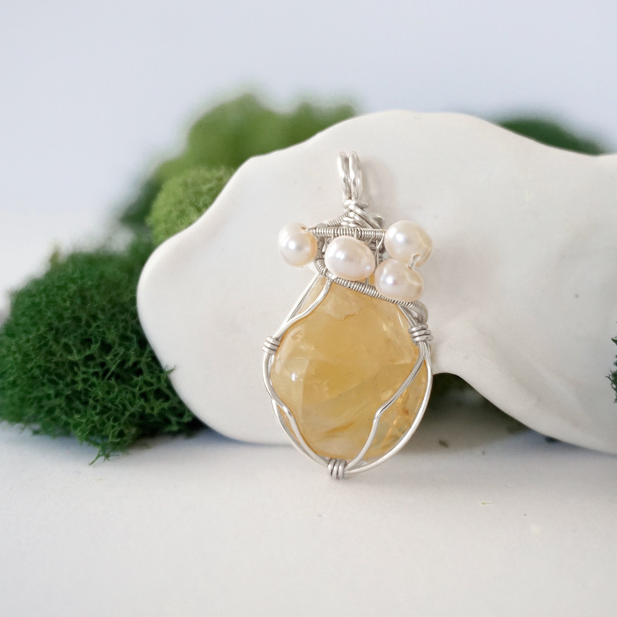 Detailed front view of silver wire wrapped citrine and freshwater pearl pendant, unique artisan necklace