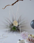 Close up front view of natural citrine crystal wire wrapped in sterling silver 925 - huggie necklace pendant detail showing golden gemstone handmade