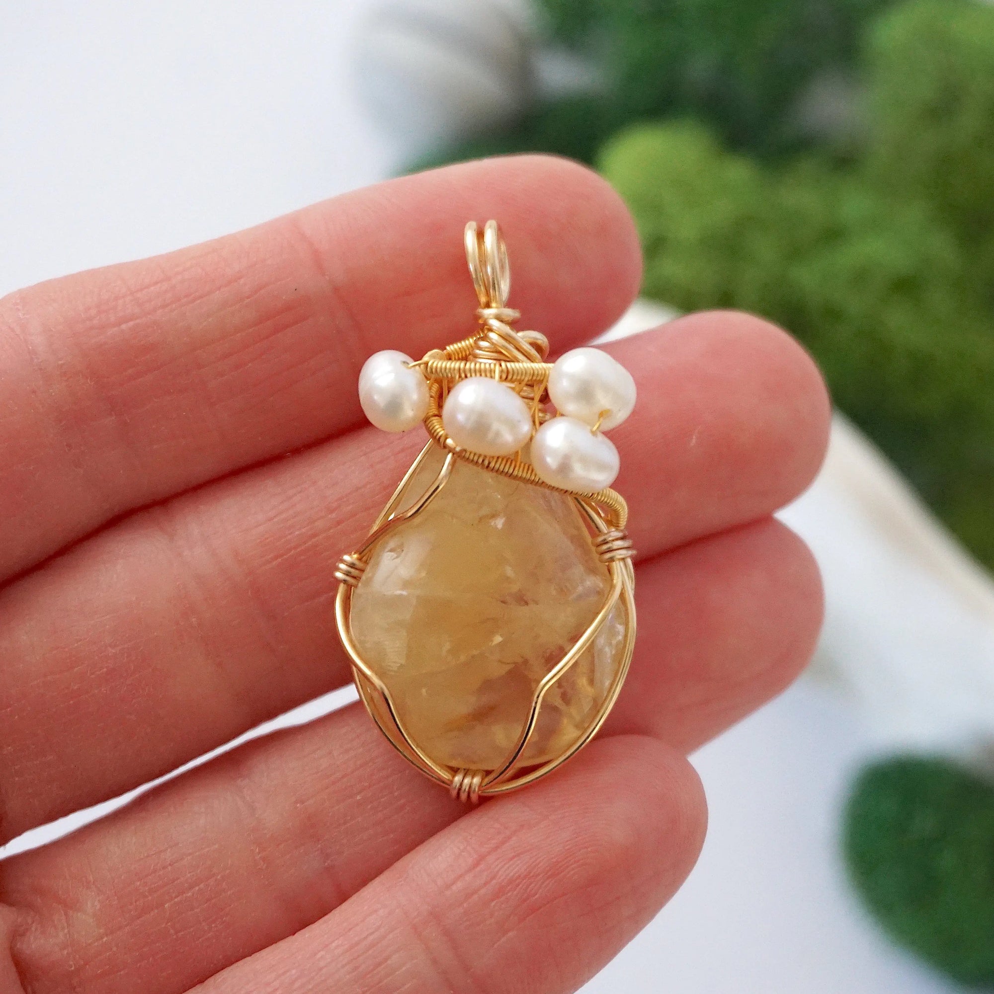 Citrine and pearl necklace size comparison in hand showing pendant dimensions - natural crystal freshwater pearl gold plated handmade jewelry size reference