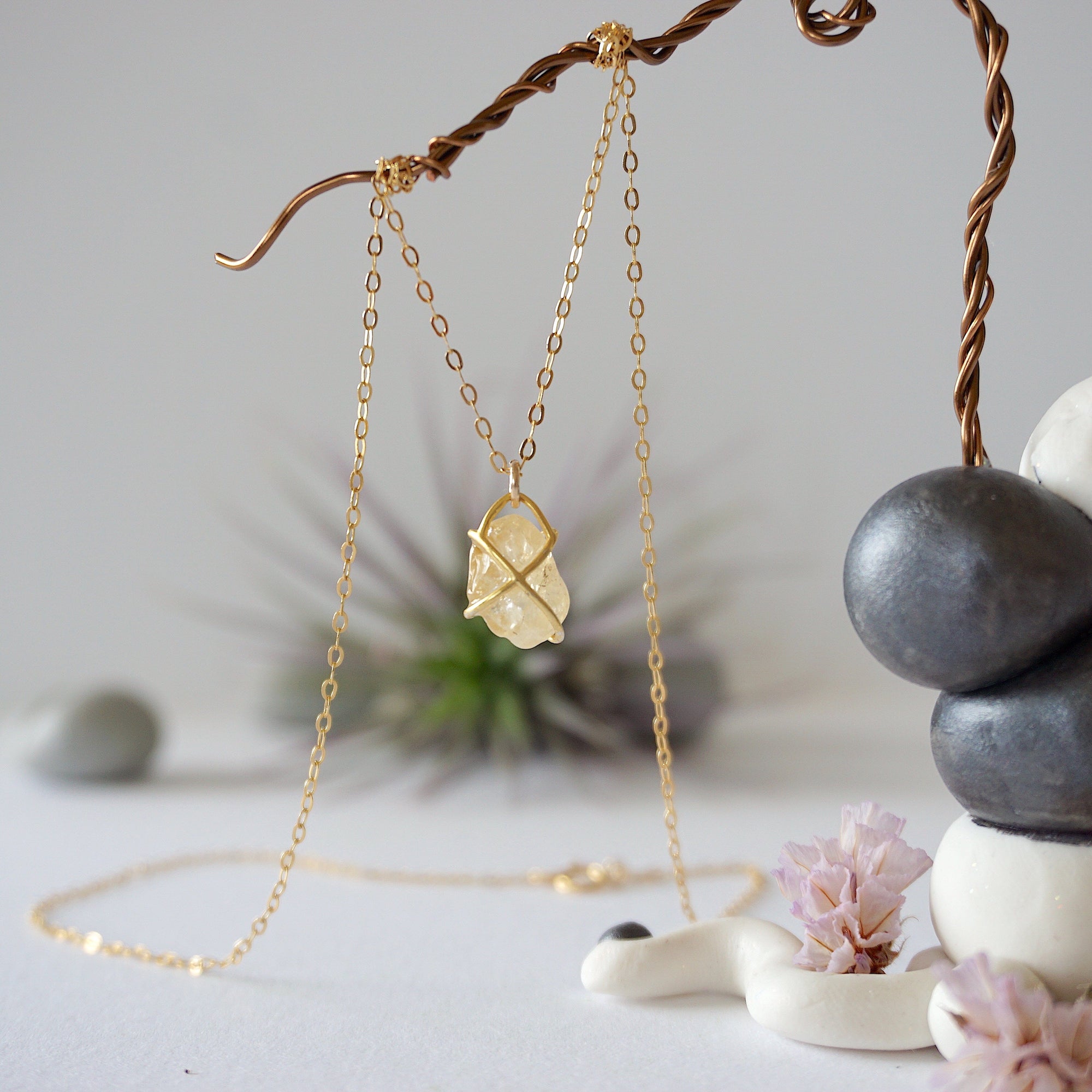 Close up back view of citrine pendant showing 14k gold-filled wire wrapping detail and craftsmanship - charm necklace back side artisan jewelry