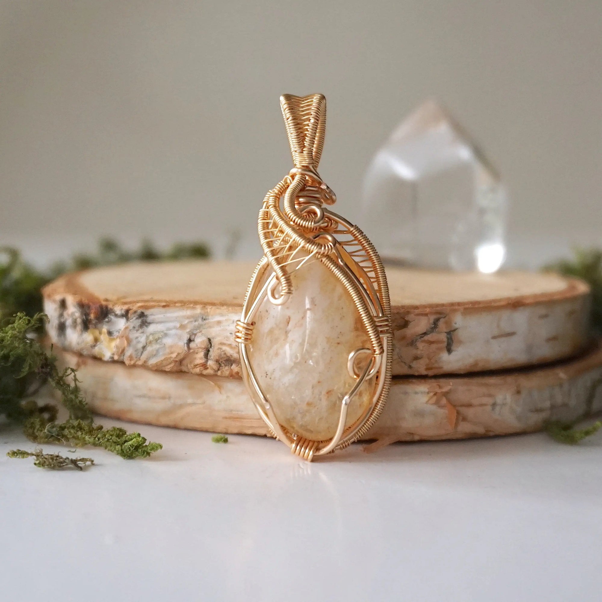 Back view of citrine pendant gold wire wrapped showing artisan craftsmanship November birthstone necklace detail
