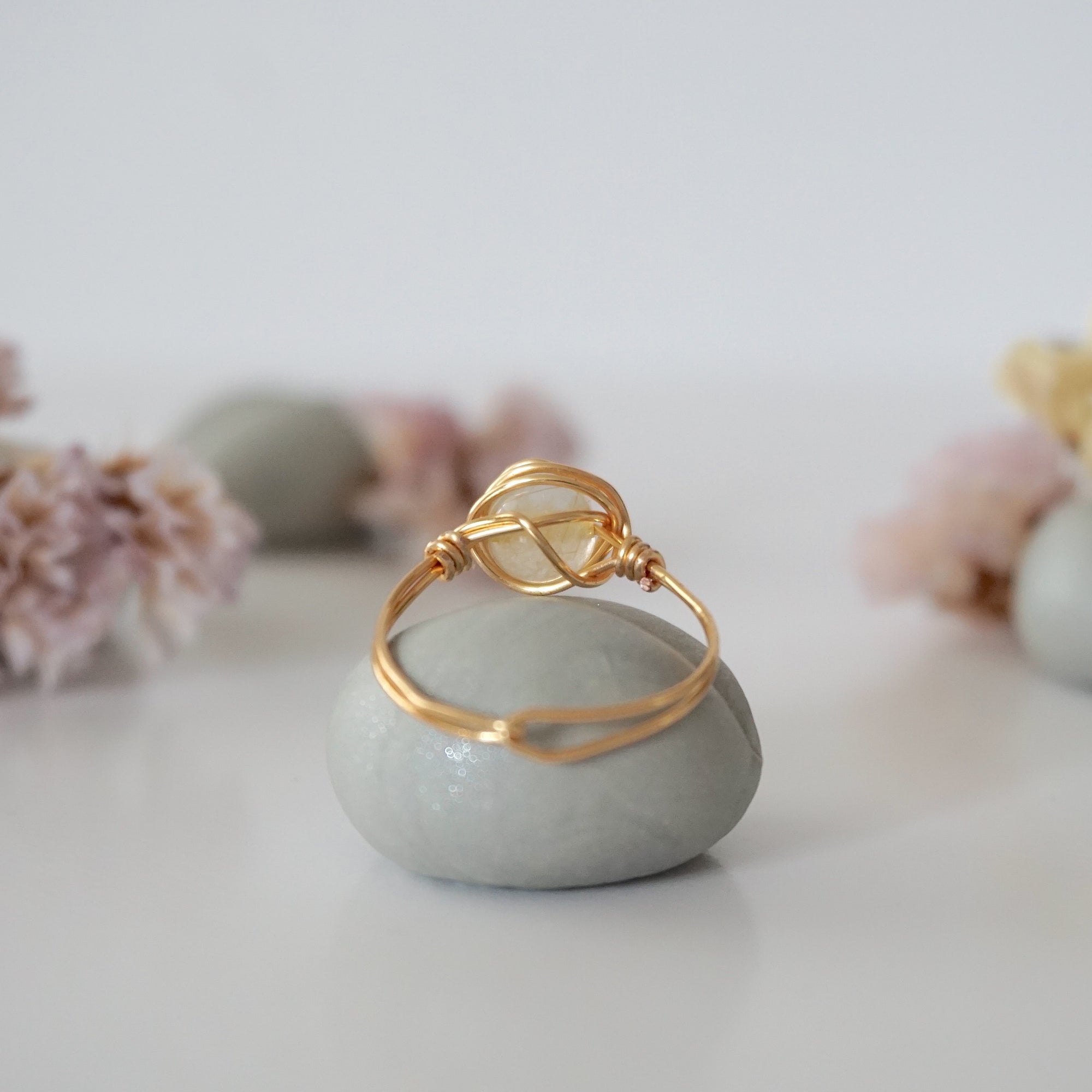 Back view of wire wrapped citrine ring showing artisan craftsmanship and metal wire detail - simple handmade crystal ring back side