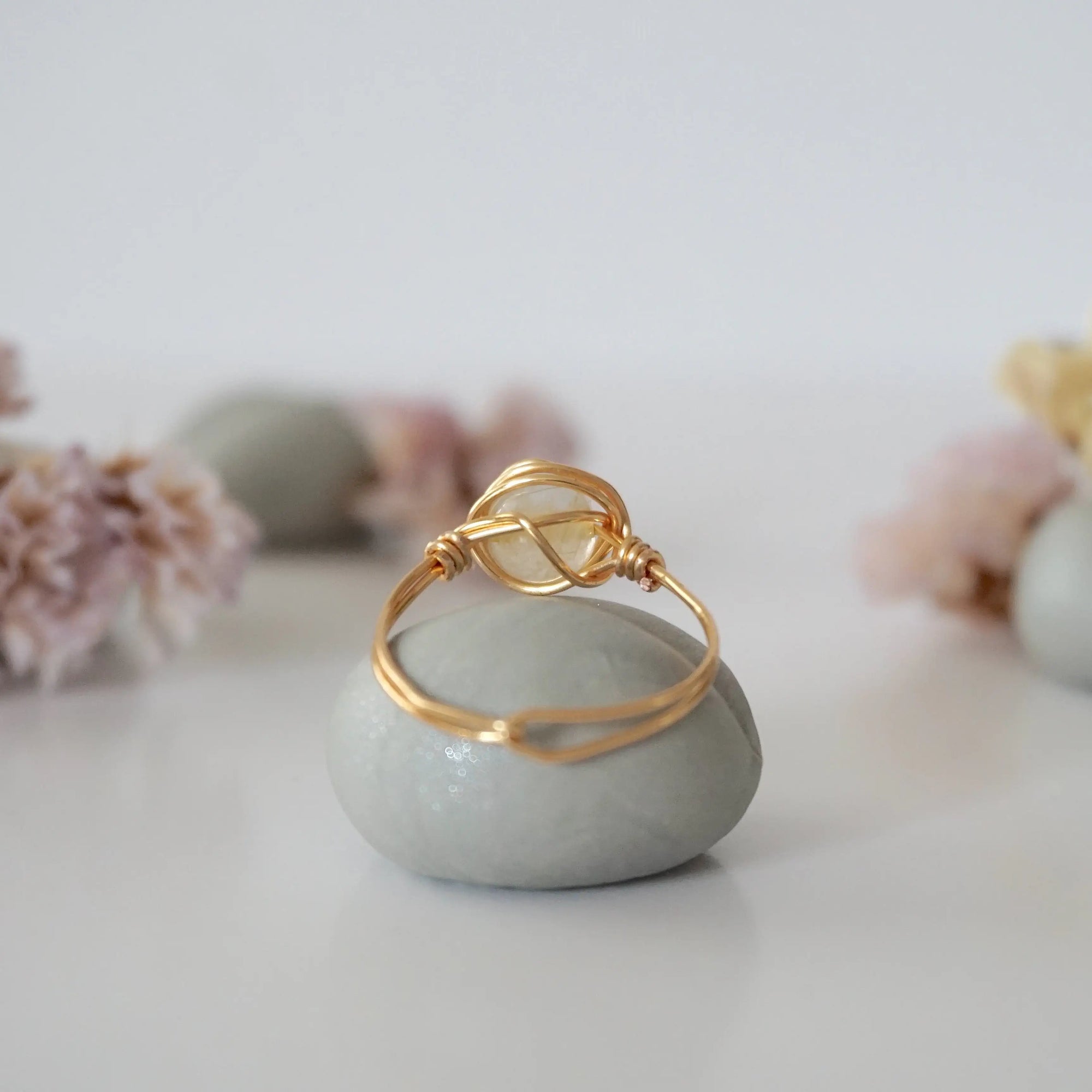 Back view of wire wrapped citrine ring showing artisan craftsmanship and metal wire detail - simple handmade crystal ring back side