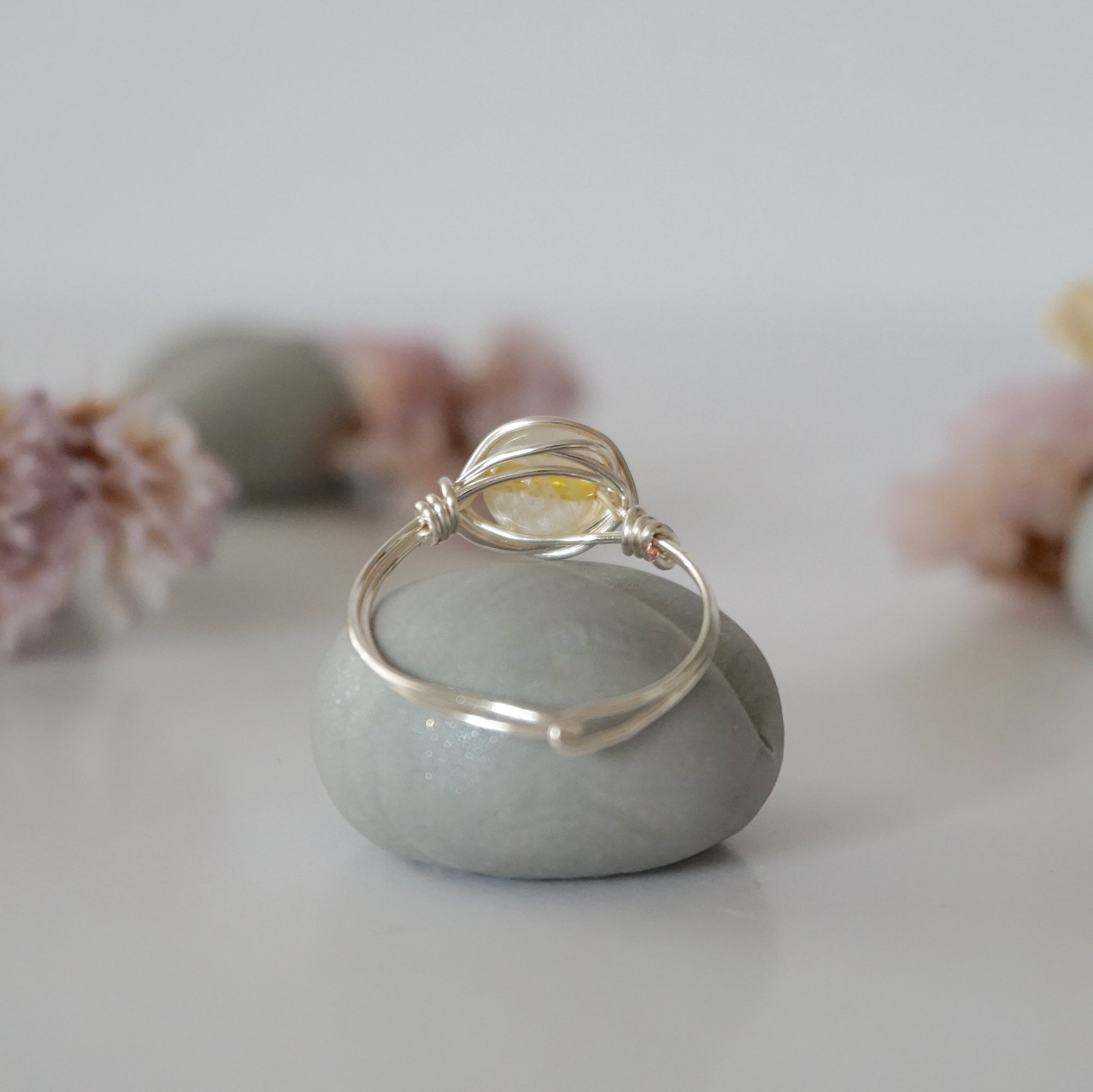 Back view of wire wrapped silver citrine ring showing artisan craftsmanship and metal wire detail - simple handmade crystal ring back side