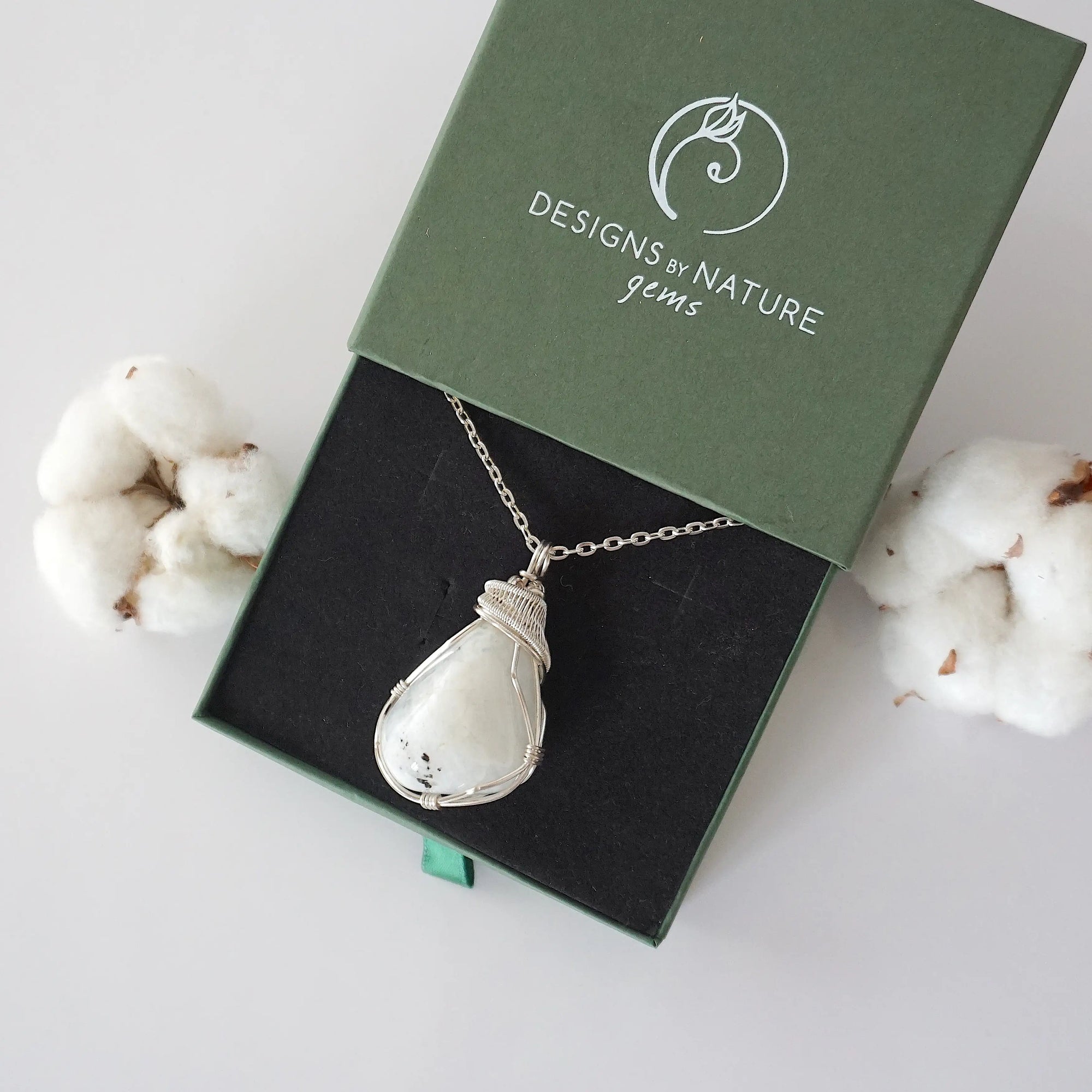 Rainbow moonstone necklace in Designs by Nature Gems branded jewelry box ready for gifting