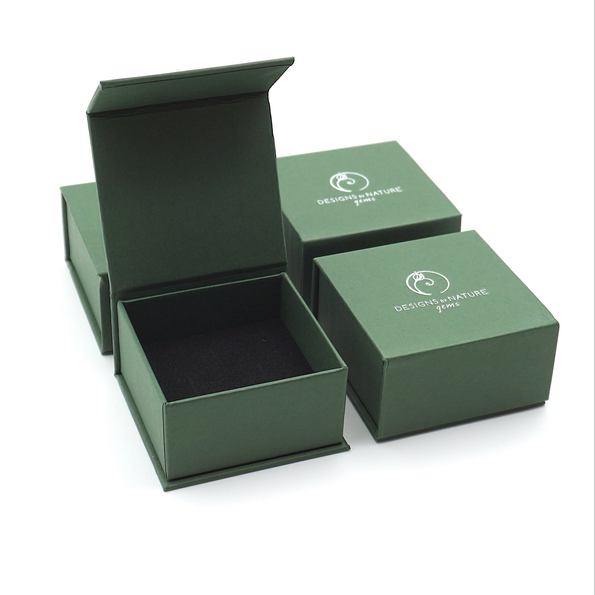 Designs by Nature Gems jewelry box packaging for handcrafted raw emerald stud earrings in 14k gold vermeil