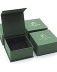 Designs by Nature Gems branded jewelry box packaging for minimalist rainbow moonstone necklace, ready for gifting.