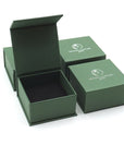 Designs by Nature Gems branded jewelry box packaging for simple amethyst ring (ring not shown)