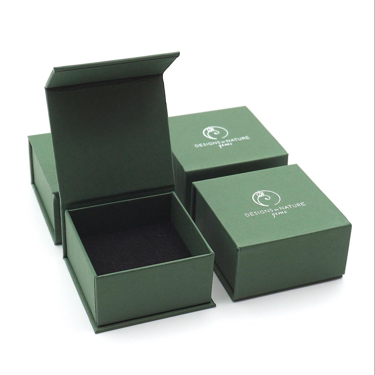 Designs by Nature Gems branded jewelry box packaging for minimalist rainbow moonstone necklace, ready for gifting.