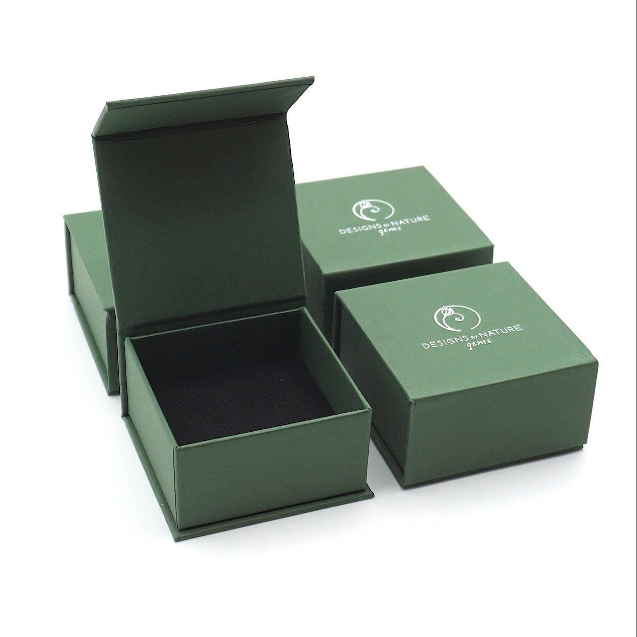 Designs by Nature Gems branded jewelry box packaging for rainbow moonstone and lotus necklace, ready for gifting.