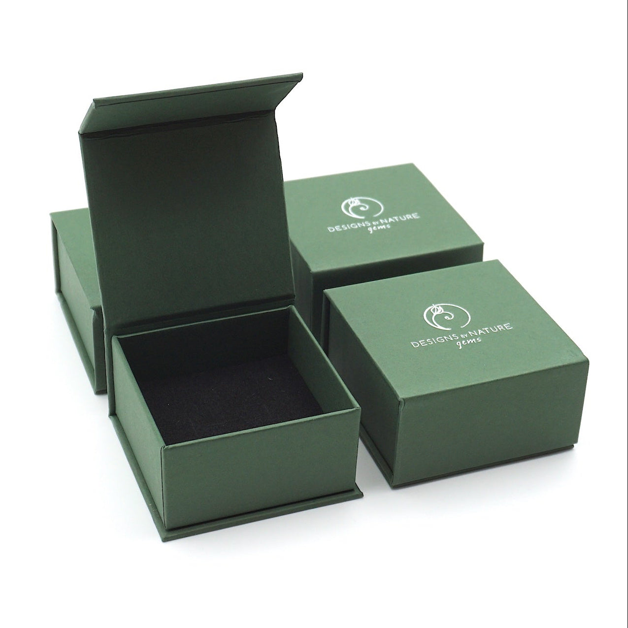 Designs by Nature Gems branded jewelry box — gift-ready packaging included with every raw ruby stud earring purchase