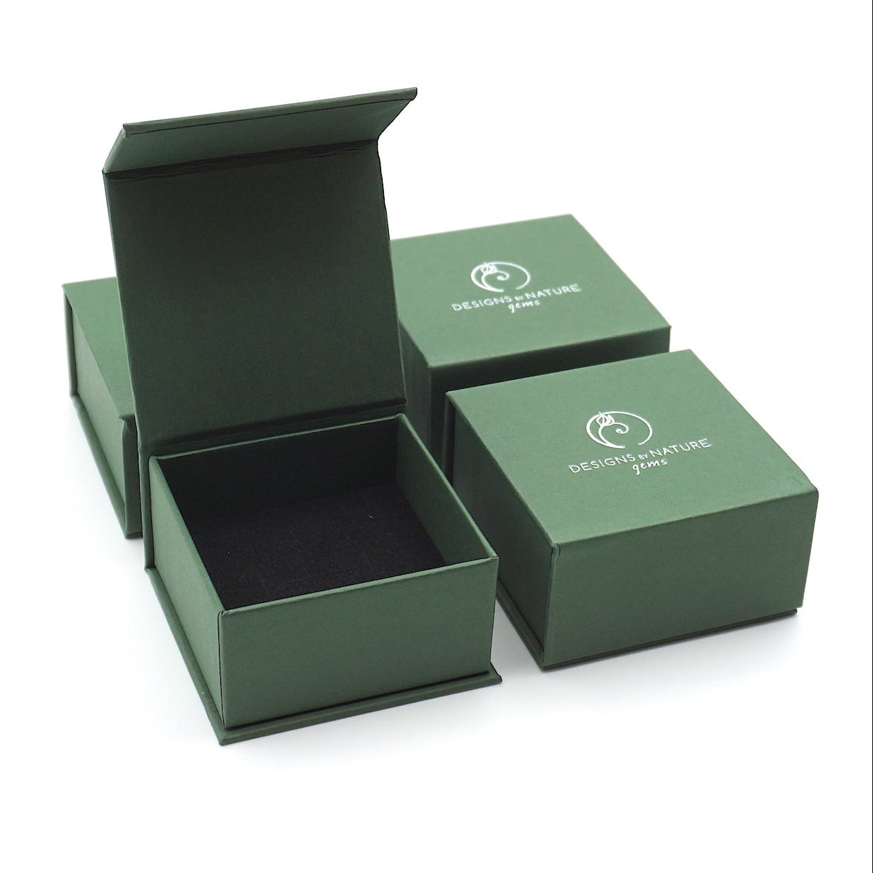 Raw sapphire stud earrings with sterling silver posts will come in a Designs by Nature Gems branded jewelry box — ready for gifting