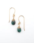 Detailed front view of emerald drop earrings, genuine faceted emerald with minimalist 14k gold filled wire wrapping, Designs by Nature Gems
