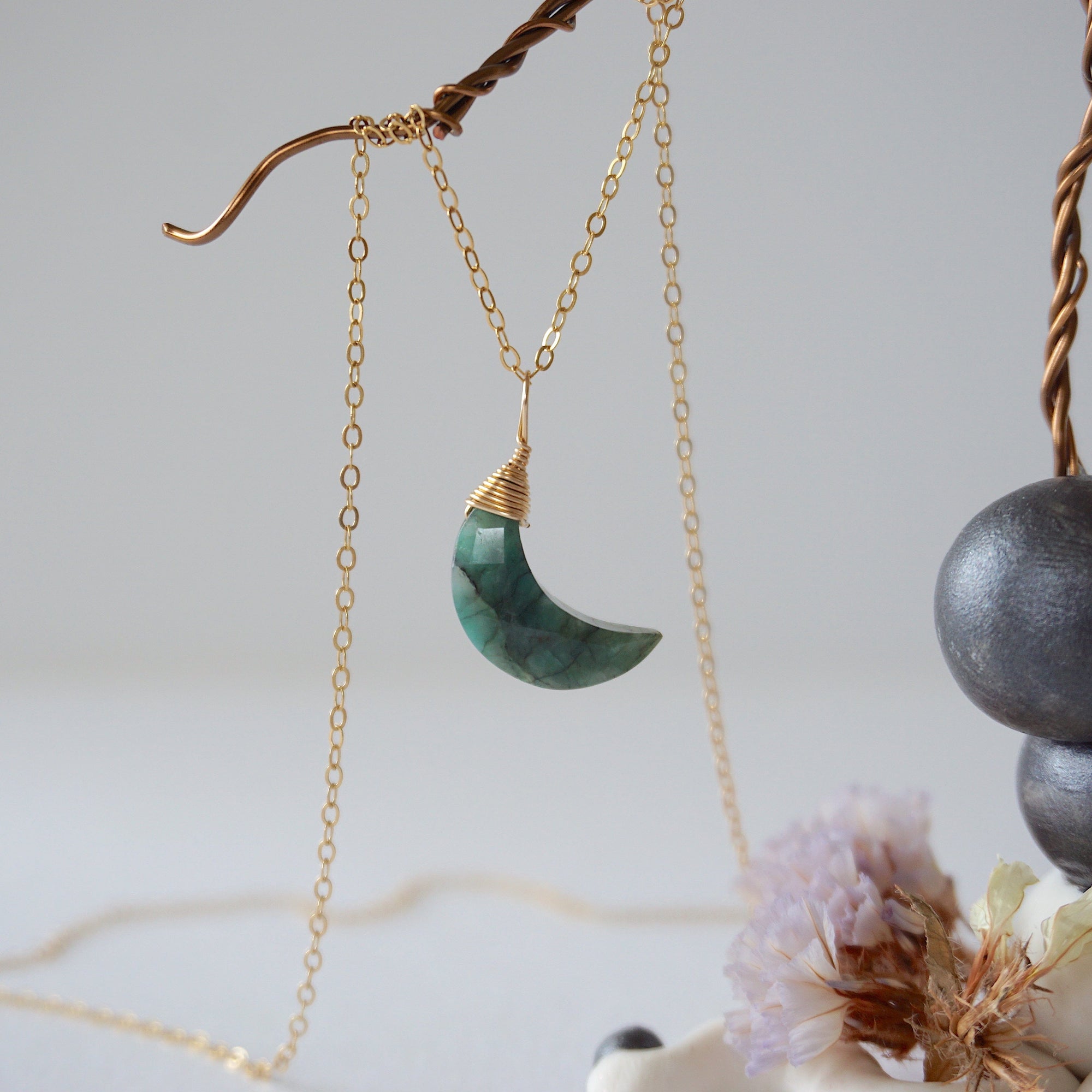 Emerald moon necklace for women with natural faceted emerald crescent pendant in 14k gold filled, detailed front view