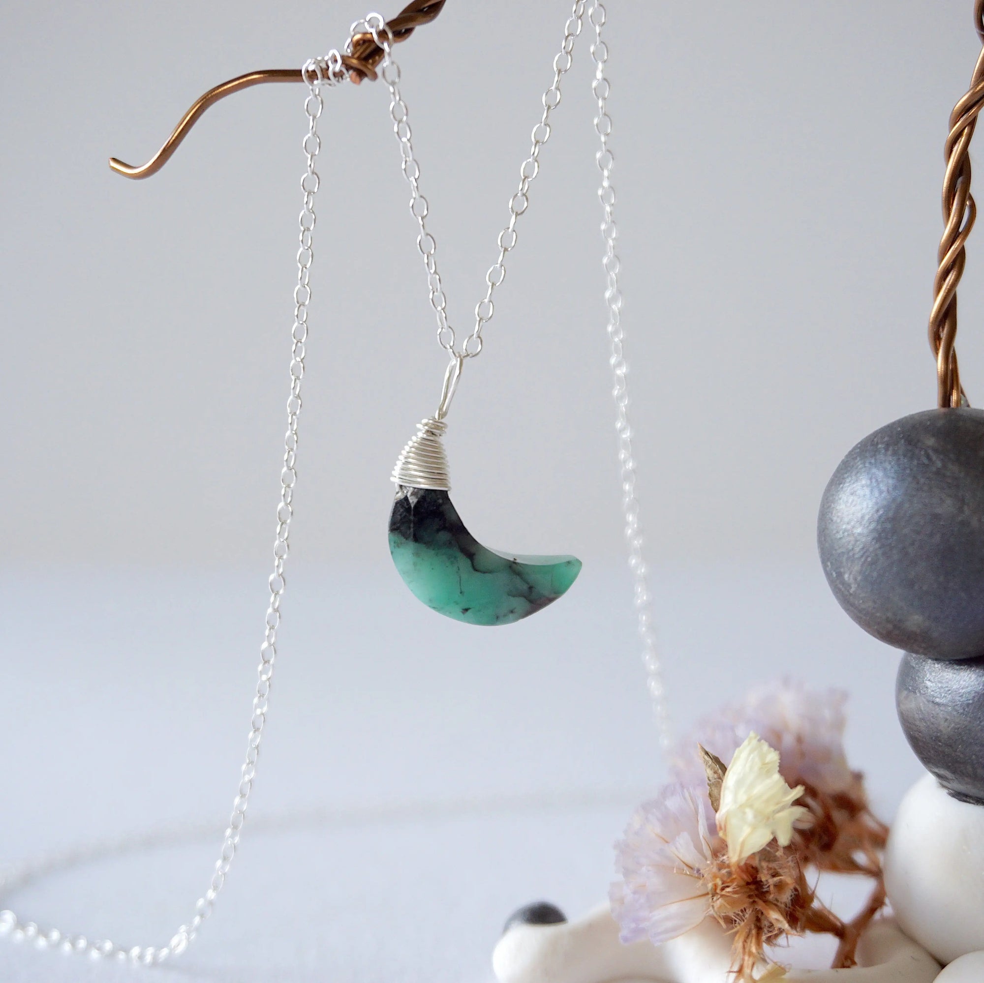 Emerald moon necklace for women with natural faceted emerald crescent pendant in 925 sterling silver, detailed front view