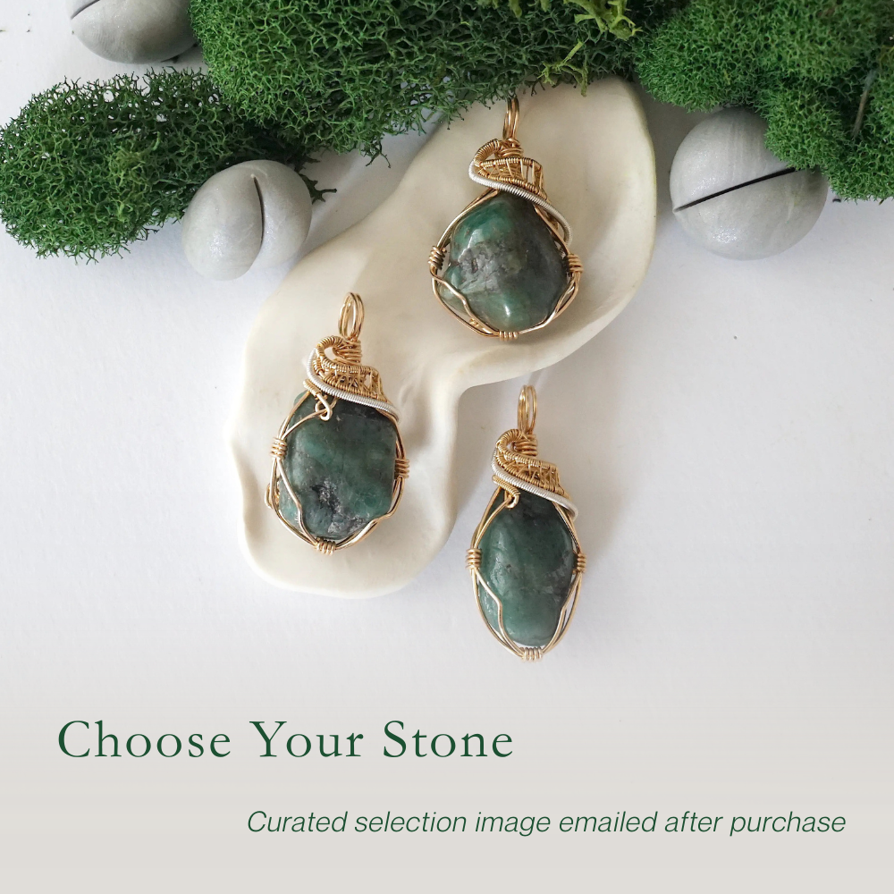 Three emerald pendants for women showing natural variation in emerald size, shape, and green colour with 14k gold filled and sterling silver wire wrapping