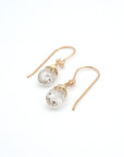 Angled look at herkimer diamond drop earrings, artisan wire wrapping in 14k gold filled, April birthstone