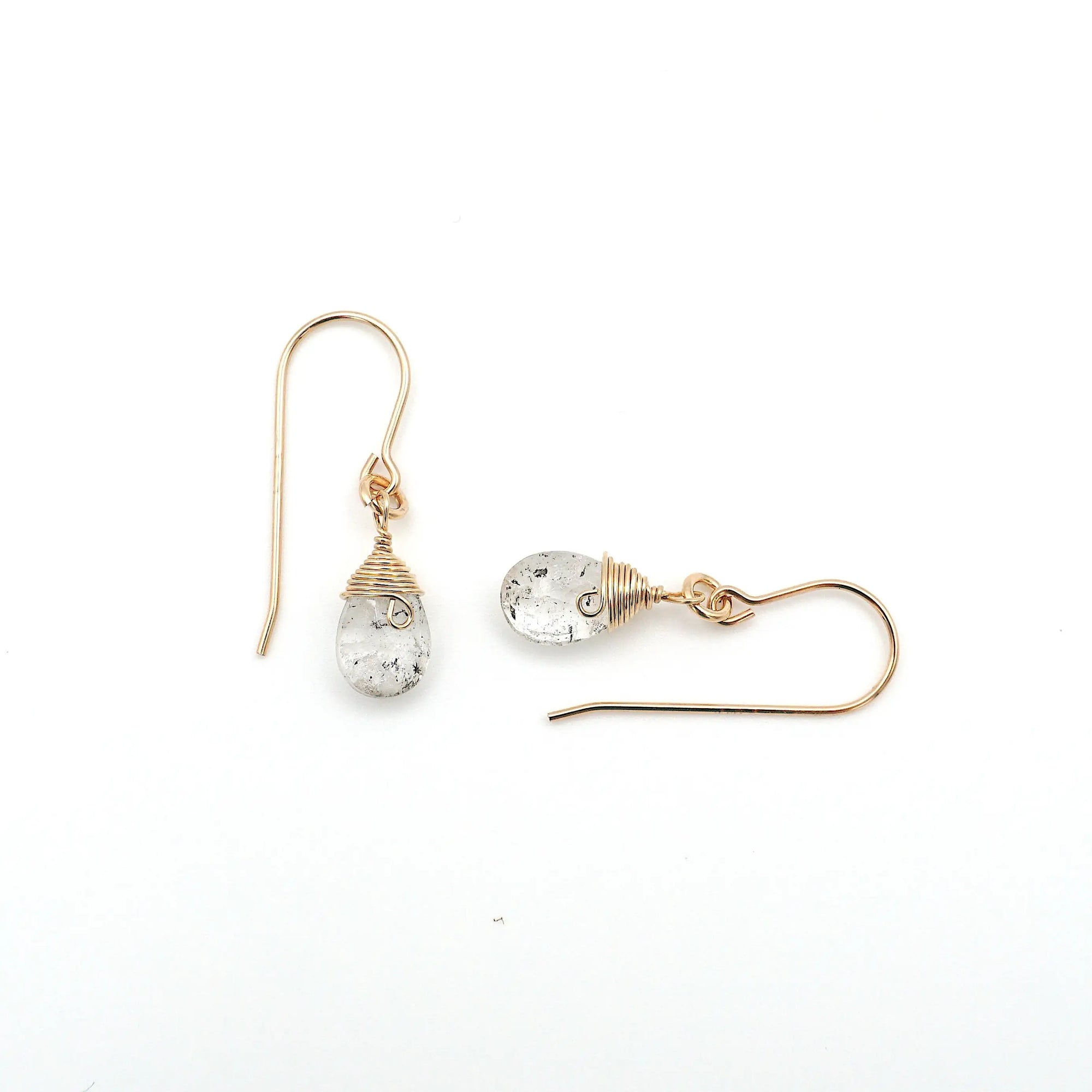Closeup showing details of herkimer diamond drop earrings, faceted herkimer diamond stone, 14k gold filled setting