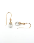 Closeup showing details of herkimer diamond drop earrings, faceted herkimer diamond stone, 14k gold filled setting