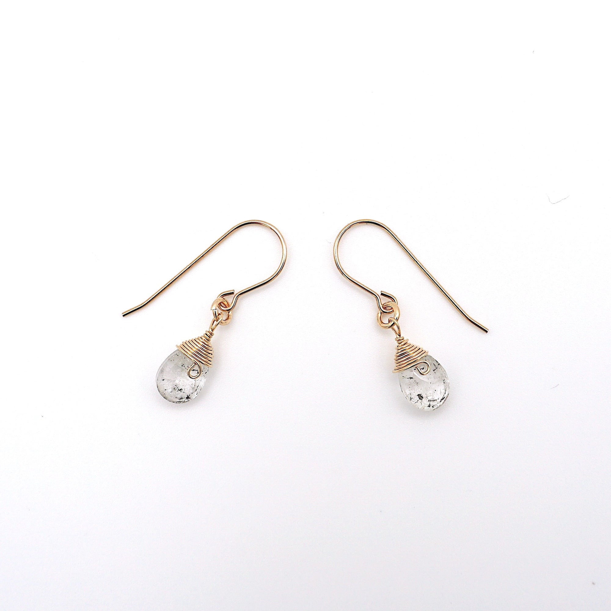 Side angle of herkimer diamond drop earrings, minimalist artisan wire wrapping, 14k gold filled