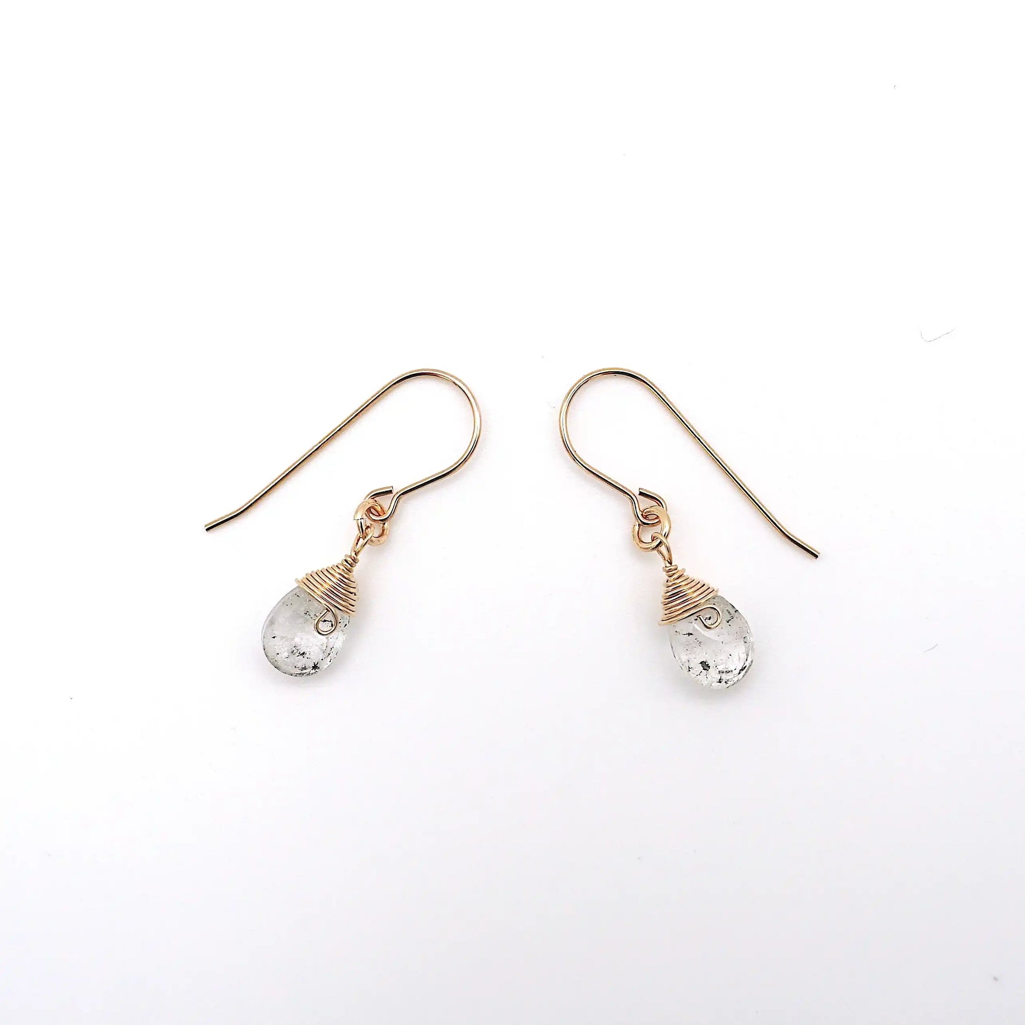 Side angle of herkimer diamond drop earrings, minimalist artisan wire wrapping, 14k gold filled