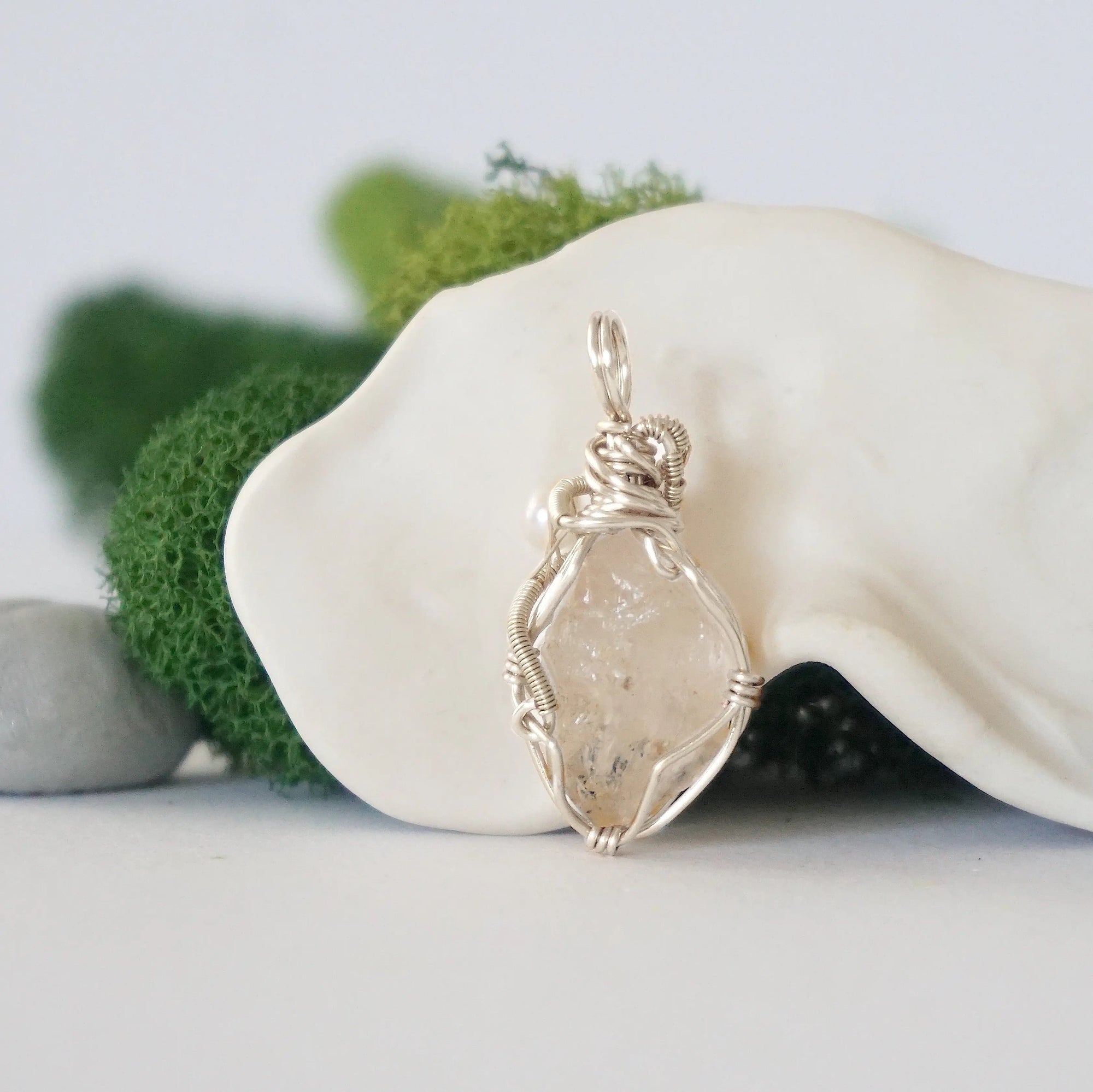 Back detail of silver wire wrapped herkimer diamond and freshwater pearl pendant necklace, handcrafted gemstone jewelry