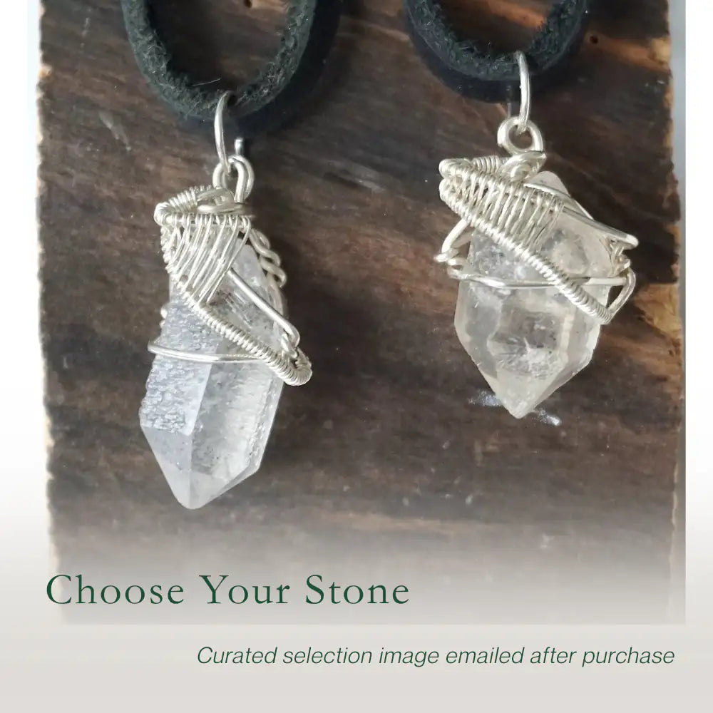 Two Herkimer diamond pendants for men showing natural variation in crystal size, shape, and handcrafted sterling silver wire wrapping.