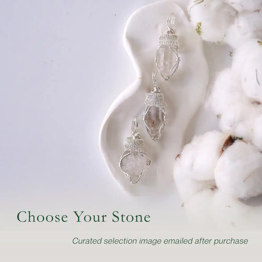 Three raw Herkimer diamond pendants for women showing natural variation in crystal shape, size, and artisan wrapping.